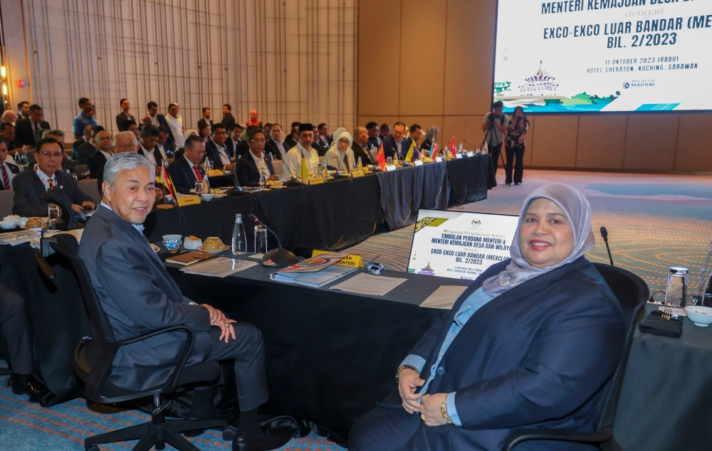 Deputy Prime Minister Datuk Seri Ahmad Zahid Hamidi chairs the rural executive councillors and ministers’ coordination meeting (Mexclub) in Kuching, October 11, 2023. Also in attendance was Deputy Minister of Rural and Regional Development Datuk Rubiah Wang (right). — Bernama pic 