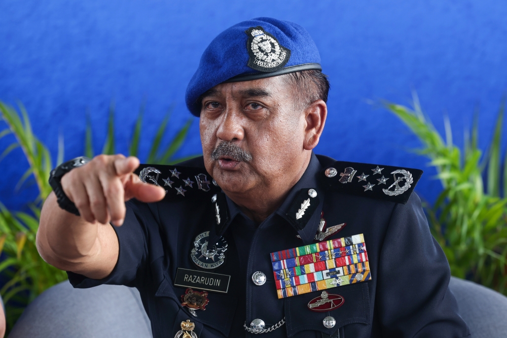 IGP Tan Sri Razarudin Husain speaks during a press conference in George Town October 12, 2023. ― Bernama pic