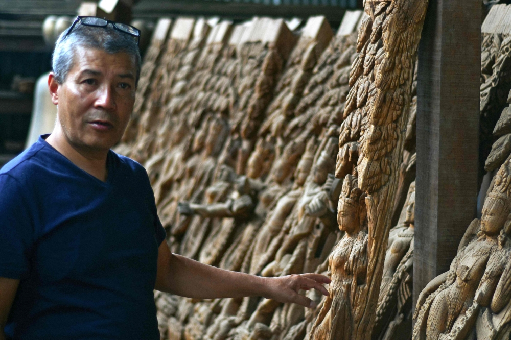 In this photograph taken on June 22, 2023, heritage conservationist and Kathmandu Valley Preservation Trust director Rohit Ranjitkar speaks during an interview with AFP at the Patan Durbar Square in Lalitpur district on the outskirts of Kathmandu. — AFP pic