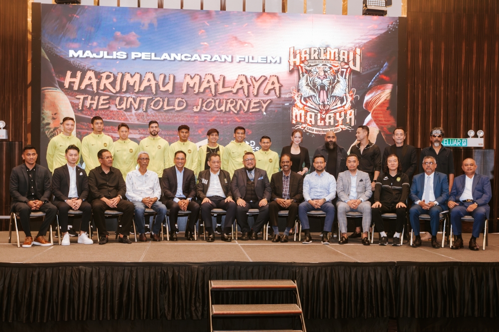 The launch at Sheraton Hotel in Petaling Jaya was attended by FAM president, Datuk Hamidin Mohd Amin (sixth from left), Harimau Malaya head coach, Kim Pan-Gon (third from right) as well as members of current Harimau Malaya squad. — Picture by Raymond Manuel.