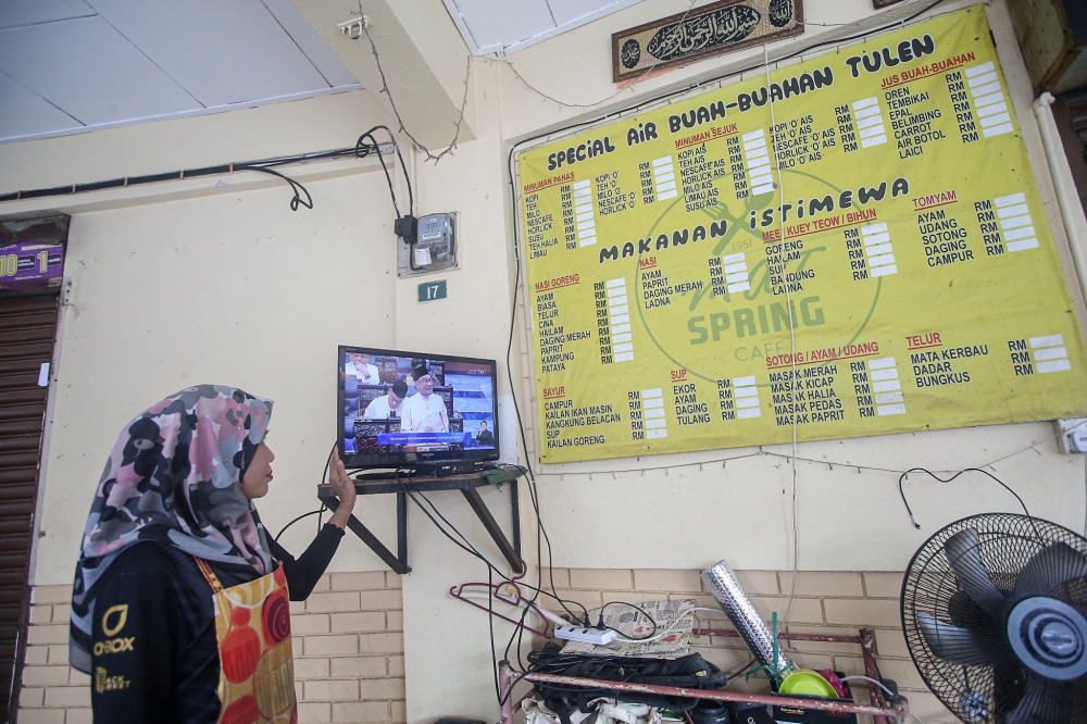 Prime Minister Datuk Seri Anwar Ibrahim tables Budget 2024 in the Dewan Rakyat October 13, 2023. ― Picture by Farhan Najib