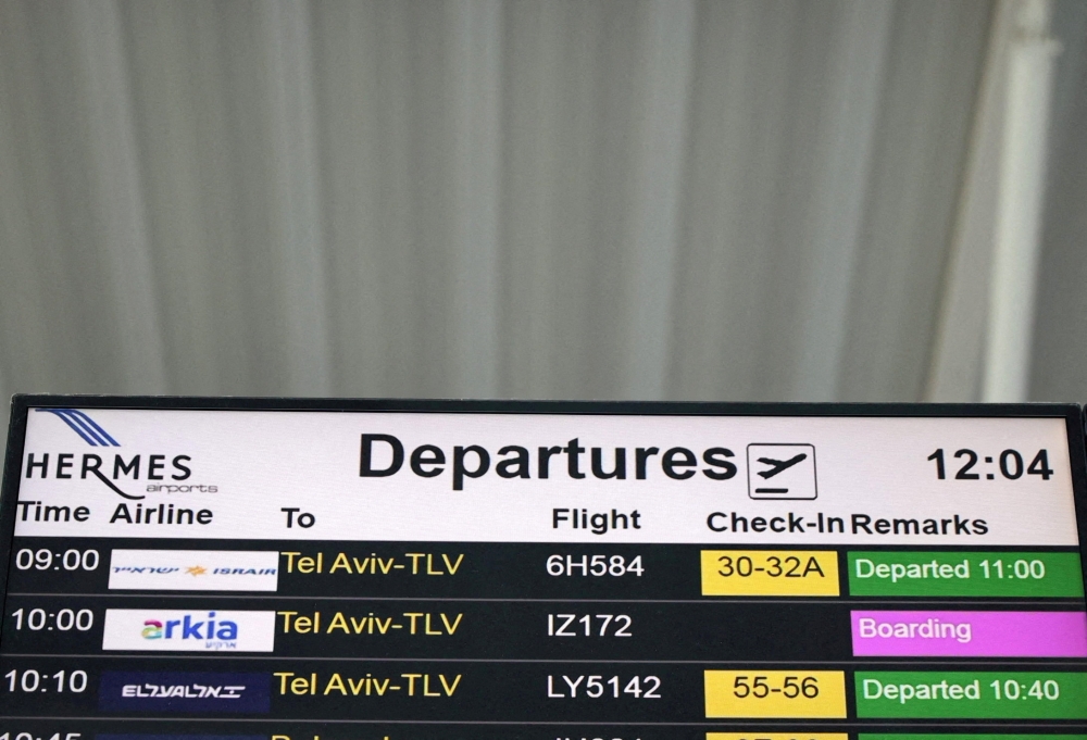 A departures board announcing flights to Tel Aviv, Israel, is seen in Larnaca International Airport, in Larnaca, Cyprus October 9, 2023. ― Reuters file pic
