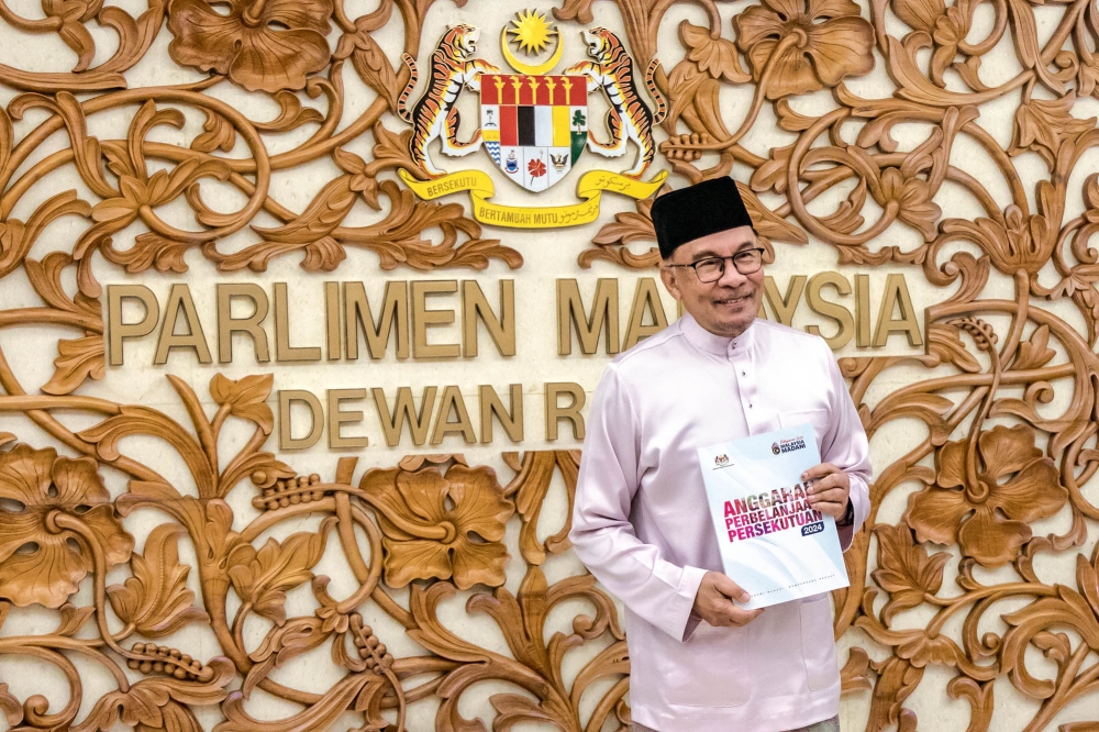 As Anwar's government seeks to rationalise existing subsidy spending with the intention of consolidating the country’s fiscal position, Budget 2024's amount is over RM7.66 billion than the one tabled last February according to Ministry of Finance's Fiscal Outlook and Federal Government Revenue Estimates 2024 report. — Picture by Firdaus Latif