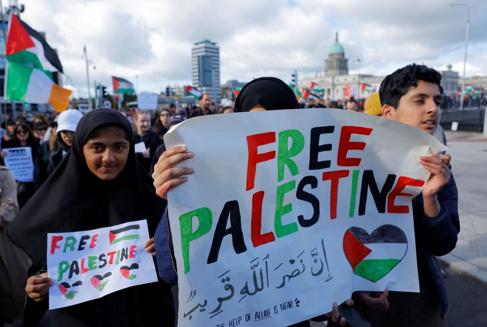 Demonstrators rally during a ‘Stand with Palestine’ march in solidarity with Gaza, in Dublin, Ireland, October 14, 2023. — Reuters pic