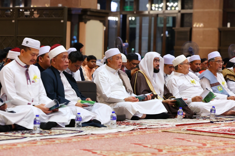 Deputy Prime Minister Datuk Seri Ahmad Zahid Hamidi (3rd left) attends the launch the 2023 Premier World Zikir programme at the Putra Mosque in Putrajaya October 14, 2023. — Bernama pic