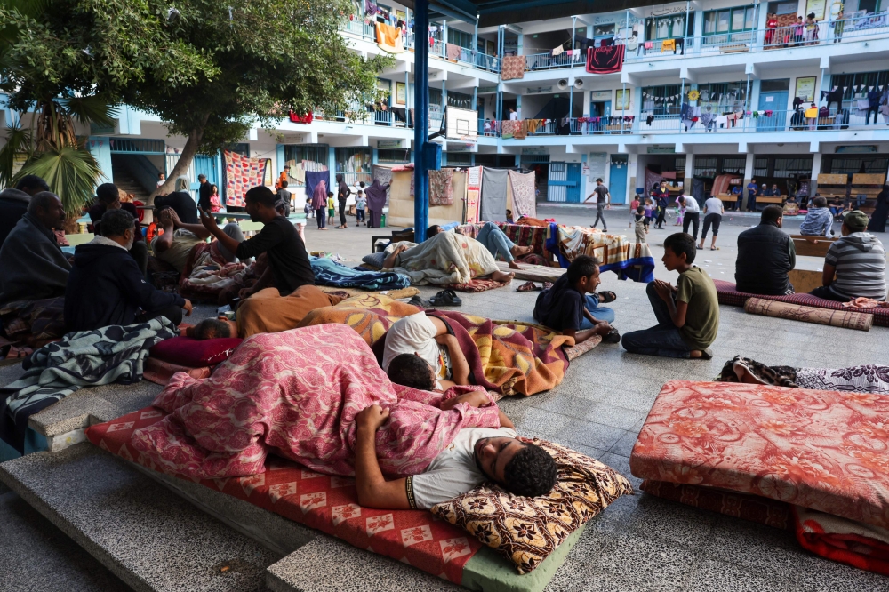 Palestinians take refuge in a United Nations school in the Rafah refugee camp, in the southern of Gaza Strip. — AFP pic