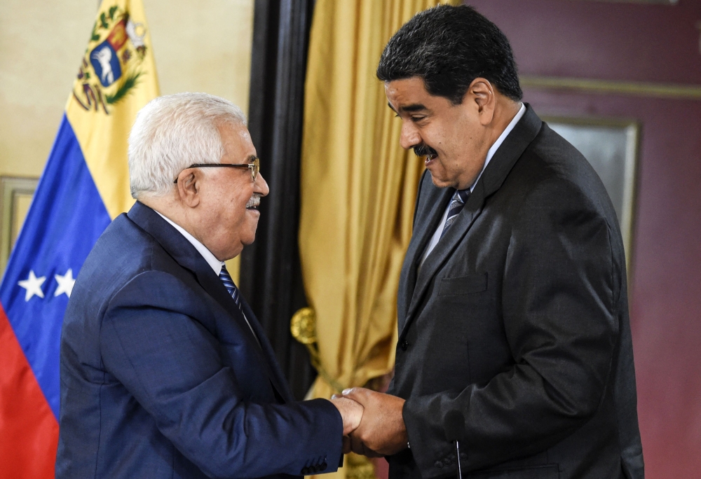 Venezuelan President Nicolas Maduro (right) with Palestinian President Mahmud Abbas during a meeting in 2018. — AFP pic