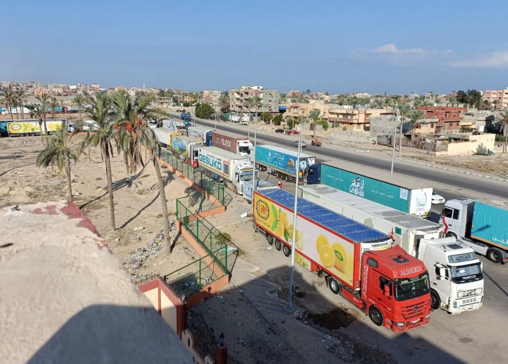 Reuters images showed aid trucks from Egyptian NGOs in the Sinai town of Al-Arish on Monday morning, waiting for permission to make the hours-long trip to Rafah. — Reuters pic