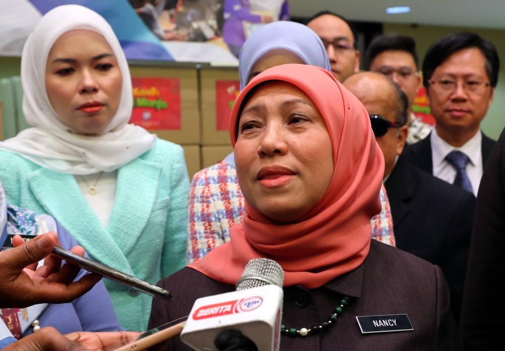 Women, Family and Community Development Minister Datuk Seri Nancy Shukri speaks to reporters after attending the Kasih Amal charity project organised by the National Welfare Foundation in Putrajaya October 16, 2023. — Bernama pic