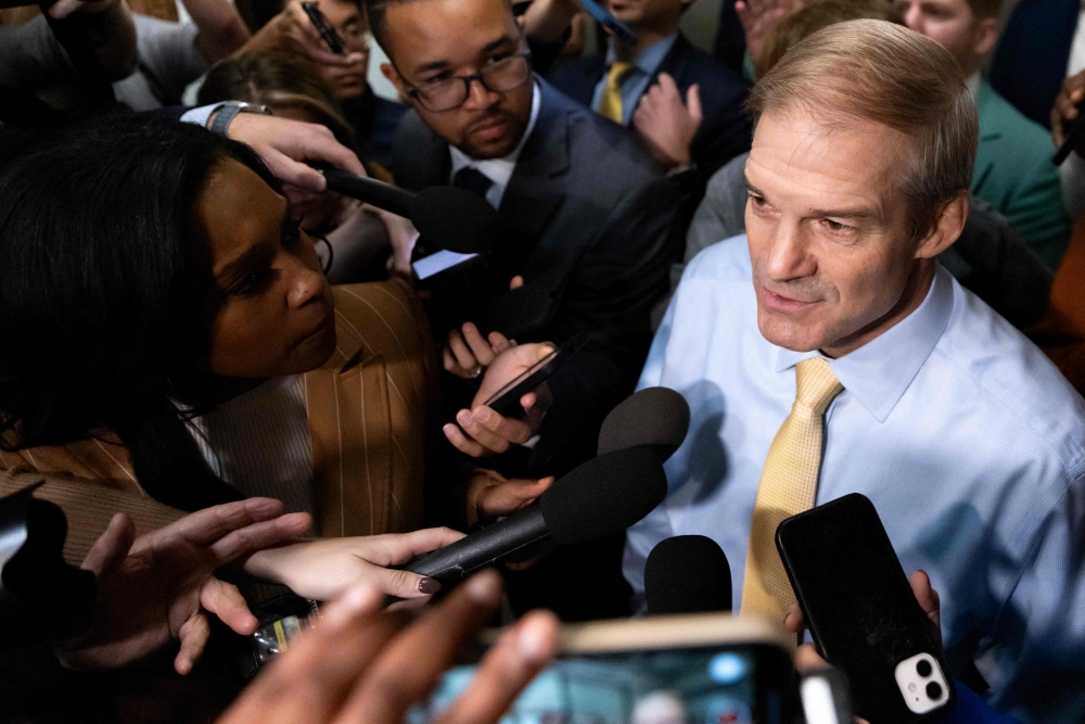 Jim Jordan, the 59-year-old chairman of the powerful Judiciary Committee who is backed by Donald Trump, has voiced confidence that he can get the 217 votes required to secure the speakership in a vote expected on Tuesday. — AFP pic