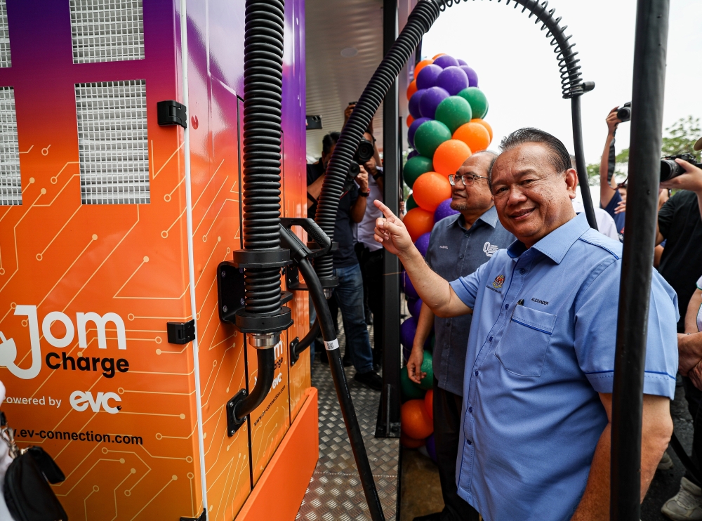Works Minister Datuk Seri Alexander Nanta Linggi at the launch of the Modular Portable Electric Vehicle (EV) Fast Charging Station with Battery Energy Storage System at the northbound Behrang lay-by along the North-South Expressway, October 17, 2023. — Bernama pic   