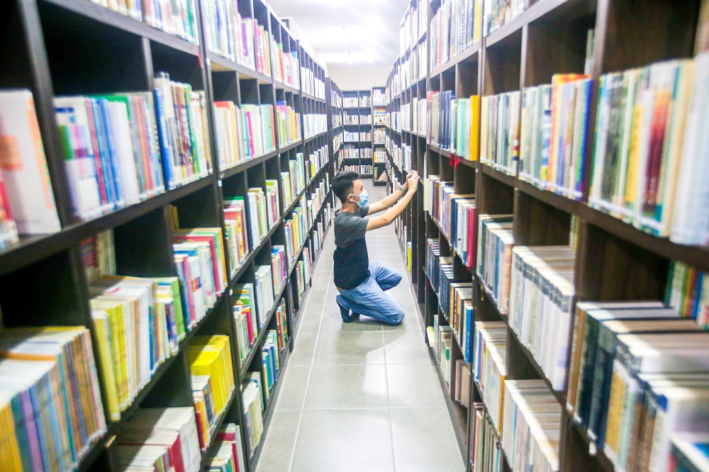 Starting with 5,000 books, the Mok Soon Sang library now boasts 30,000 books, one of the biggest private libraries in Ipoh. — Picture by Farhan Najib