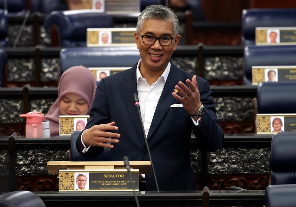 Datuk Seri Tengku Zafrul Abdul Aziz says the import licence or approved permit (AP) system for motor vehicles must be maintained so that priority is given to the local industry in ensuring an inclusive automotive industry development in line with the aspirations of the National Automotive Policy 2020.  — Bernama pic