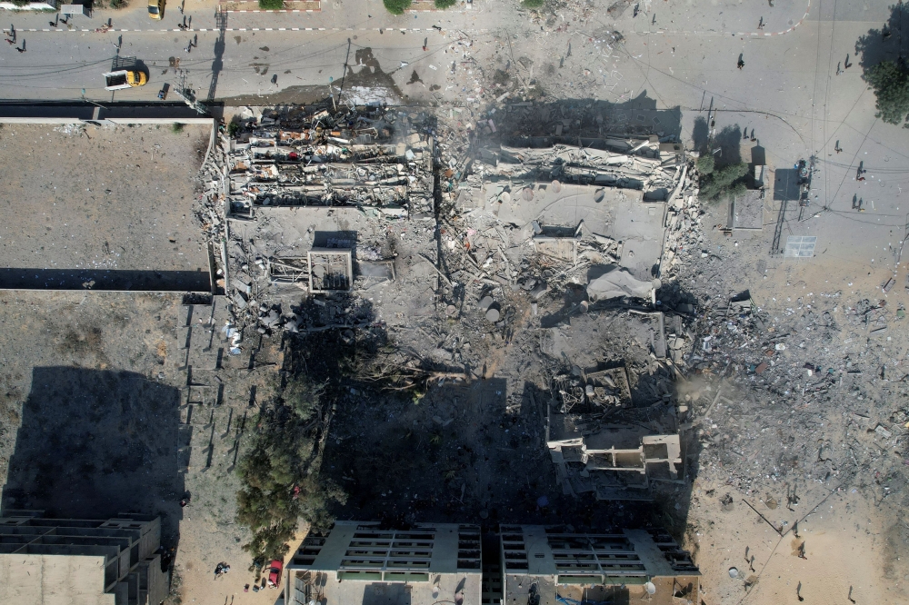 Residential buildings destroyed in Israeli strikes are seen in Zahra City, amid the ongoing conflict between Israel and Palestinian Islamist group Hamas, in southern Gaza City, October 19, 2023. — Reuters pic