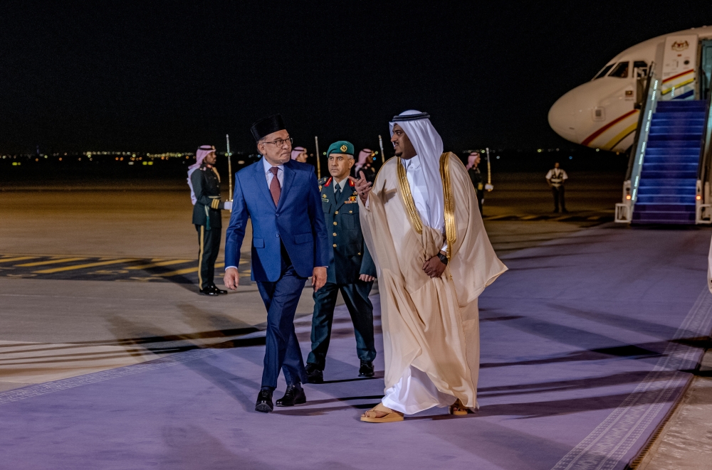 Prime Minister Datuk Seri Anwar Ibrahim is welcomed by the Deputy Governor of Riyadh Region, Prince Mohammed bin Abdulrahman (right) after he arrived at King Khalid International Airport for the Asean and Gulf Cooperation Council (GCC) Summit. ― Bernama pic