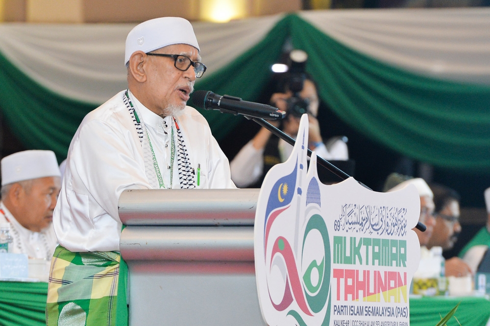 PAS president Tan Sri Abdul Hadi Awang speaks during 69th PAS Muktamar in Shah Alam October 20, 2023. ― Picture by Miera Zulyana
