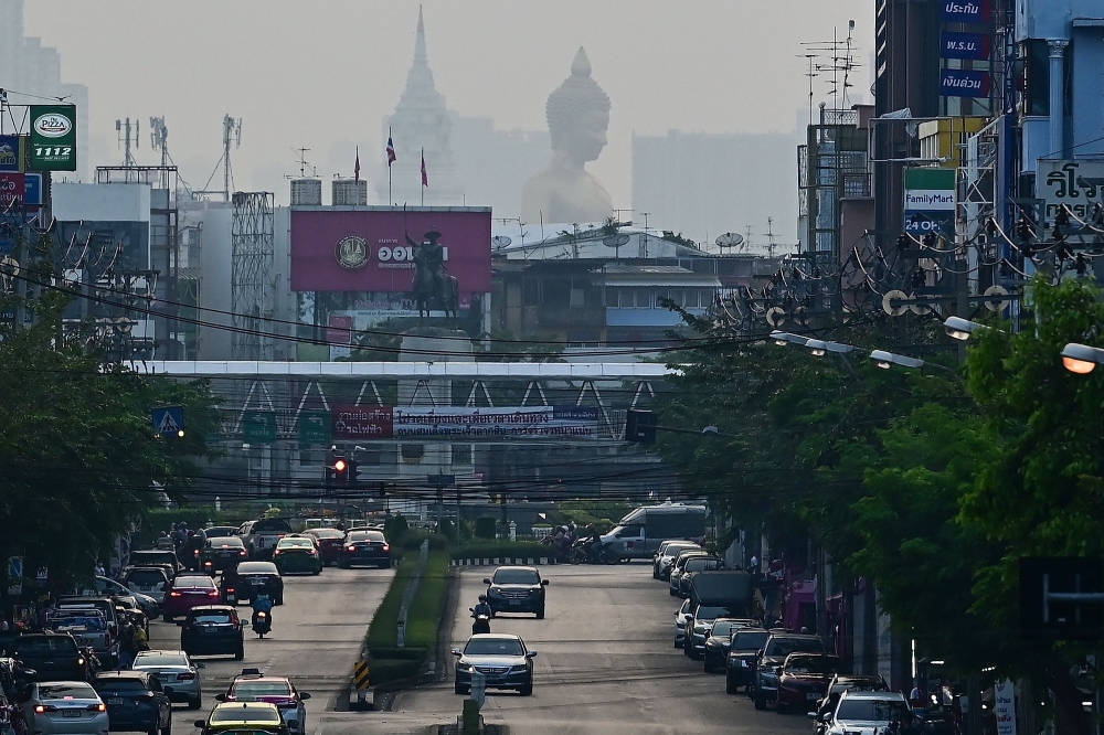 Thai officials today promised action to address a spike in air pollution that came before the normal peak of seasonal haze, but environmental activists accused authorities of hot air. — AFP pic