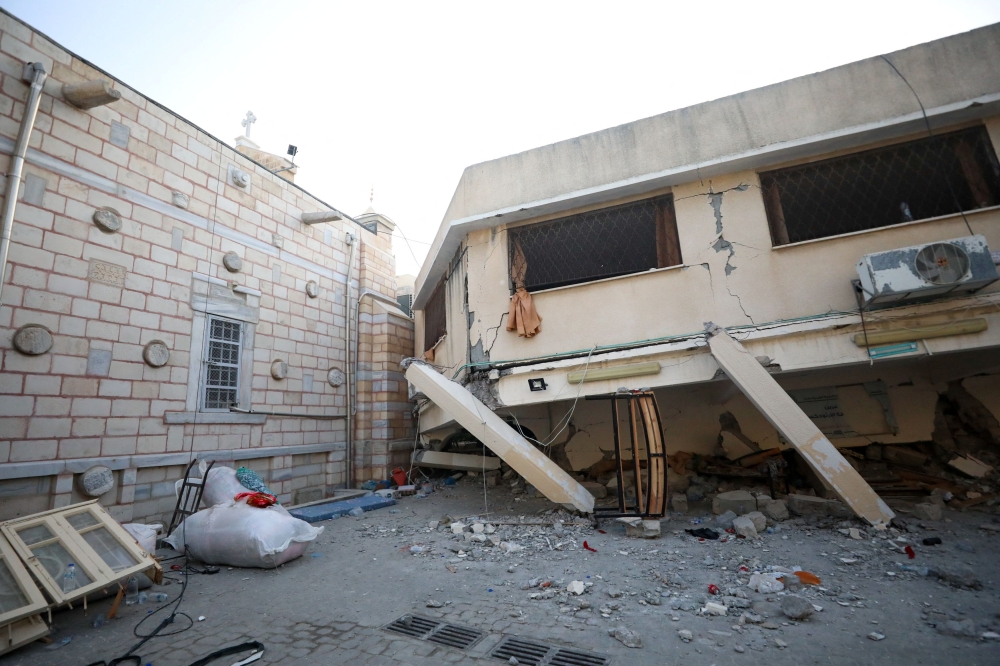 A general view at the Greek Orthodox Saint Porphyrius Church which was damaged by an Israeli strike, where Palestinians who fled their homes take shelter, in Gaza City, October 20, 2023. — Reuters pic