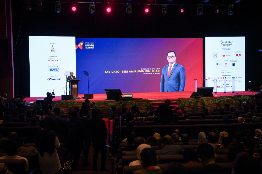 Selangor Menteri Besar Datuk Seri Amirudin Shari delivers officiating speech at the opening ceremony of Selangor International Business Summit (SIBS) 2023 at the Kuala Lumpur Convention Centre October 19, 2023. — Bernama pic