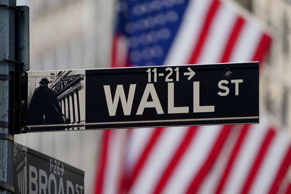 The Wall Street sign is pictured at the New York Stock exchange (NYSE) in the Manhattan borough of New York City, New York March 9, 2020. — Reuters pic