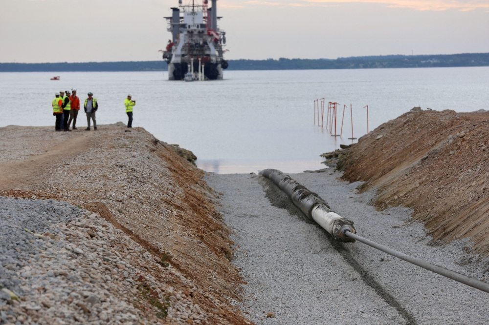 A view of the Balticconector pipeline as it is pulled into the sea in Paldiski, Estonia in an undated handout photo taken in 2019. — Elering handout pic via Reuters