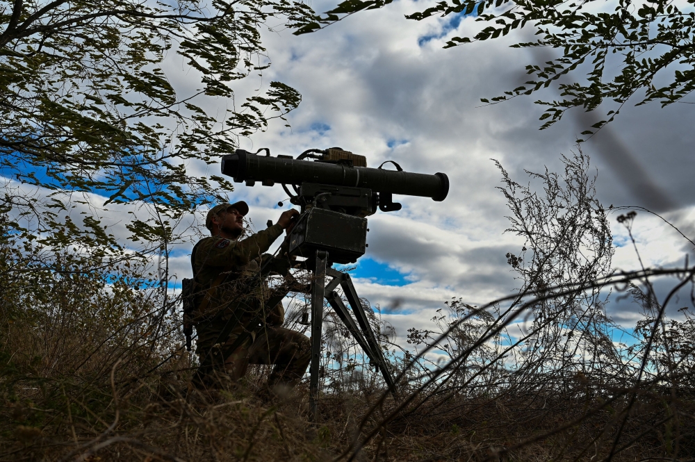 A Ukrainian serviceman checks a Skif anti-tank rocket launcher at a position in a frontline, amid Russia's attack on Ukraine, in Zaporizhzhia region October 20, 2023. — Reuters pic