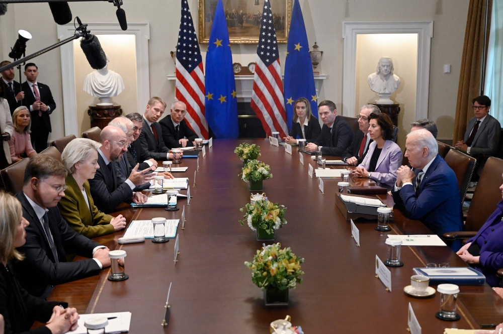 US President Joe Biden (right) meets with EU Commission President Ursula von der Leyen (third from left) and European Council President Charles Michel (fourth from left) during the EU-US summit at the White House in Washington October 20, 2023. — AFP pic