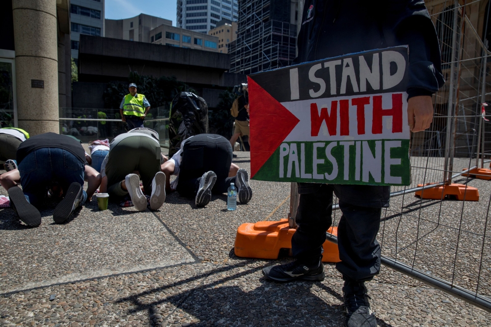 People demonstrate in support of Palestinians in Gaza as the conflict between Israel and Hamas continues, in Sydney October 21 2023. — Picture by AAP/Brent Lewin via Reuters