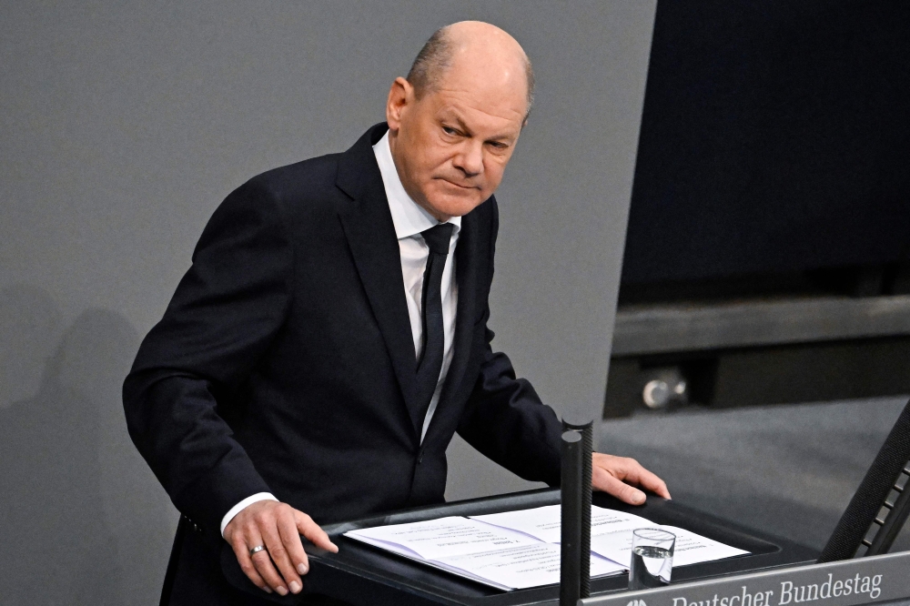 File photo of German Chancellor Olaf Scholz looking on as he addresses parliamentarians on the upcoming EU council meeting at the Bundestag, the German lower house of Parliament, in Berlin, Germany on October 19, 2023. — AFP pic