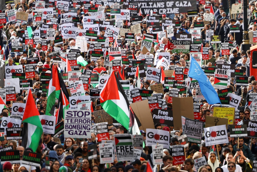Demonstrators protest in solidarity with Palestinians in Gaza, amid the ongoing conflict between Israel and the Palestinian Islamist group Hamas, in London, Britain, October 21, 2023. — Reuters pic