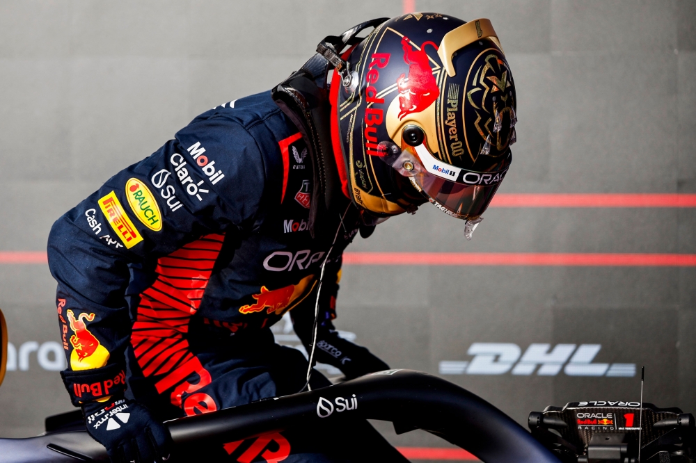 Sprint winner Max Verstappen of the Netherlands and Oracle Red Bull Racing climbs out of his car in parc ferme during the Sprint ahead of the F1 Grand Prix of United States at Circuit of The Americas on October 21, 2023 in Austin, Texas. — Chris Graythen/Getty Images/AFP pic