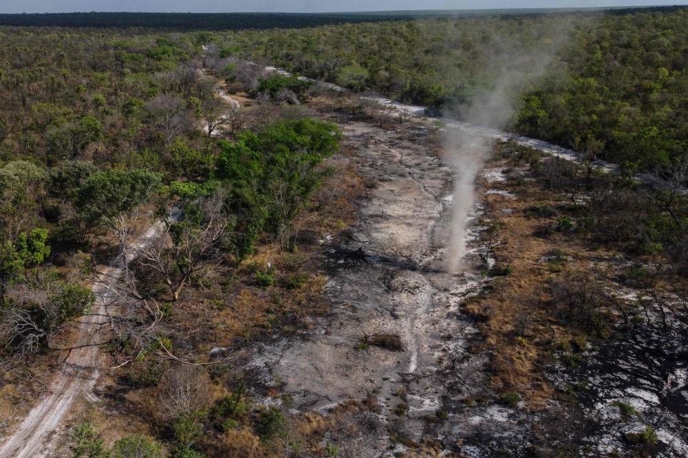 Aerial view of the dry riverbed of the Santo Antonio river in Correntina, western Bahia state, Brazil, taken on September 26, 2023. — AFP pic