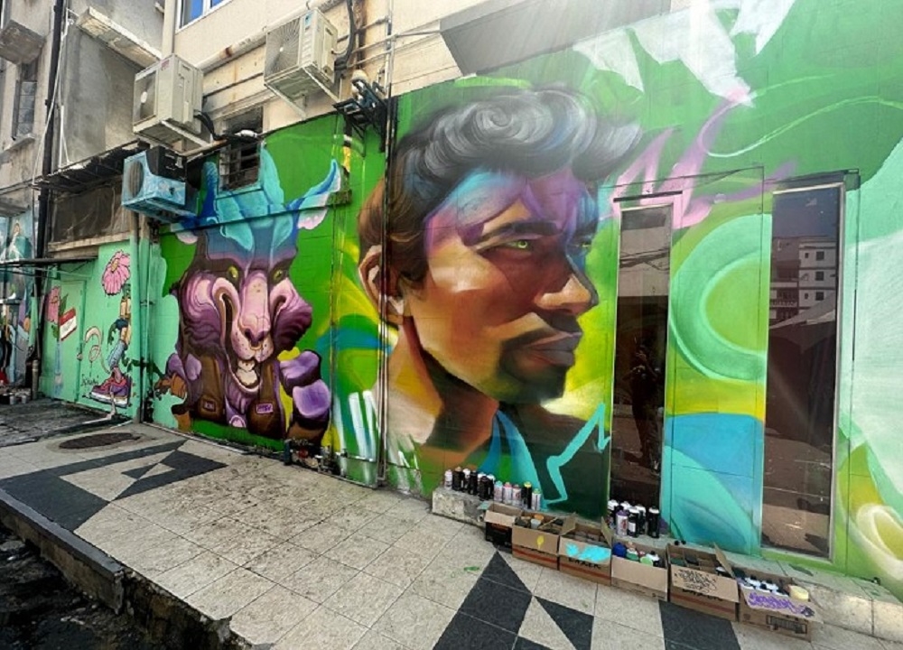 Some of the artworks showcased along Lorong Sentosa in Kampung Air through the Street Stroke programme. — Borneo Post pic