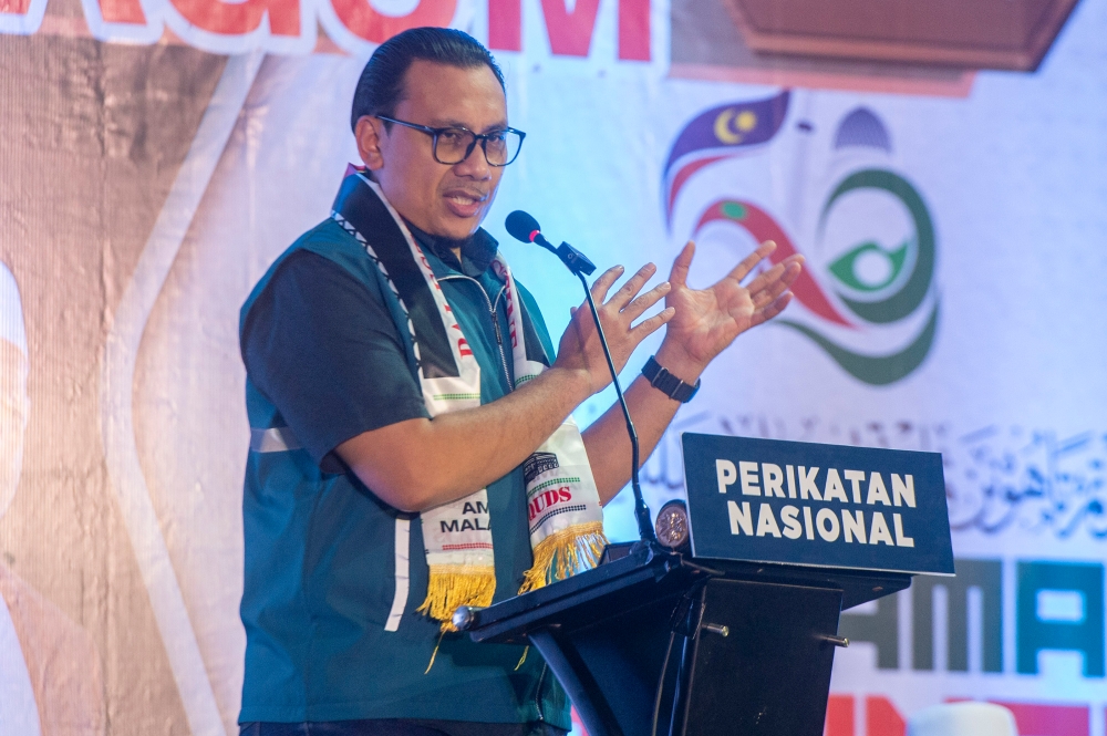 PAS youth chief, Afnan Hamimi Taib Azamudden said the party will organise another rally this Saturday. — Picture by Shafwan Zaidon