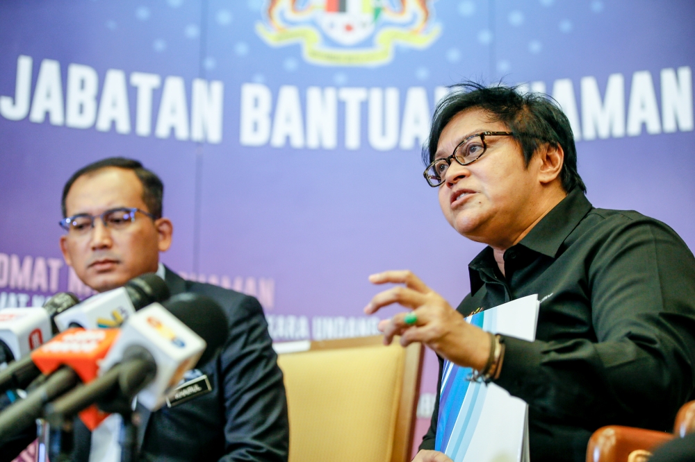 De facto law minister Datuk Seri Azalina Othman Said (right) speaks to reporters after launching the 6G Legal e-Clinic at the Legal Affairs Division building in Putrajaya October 23, 2023. — Picture by Hari Anggara