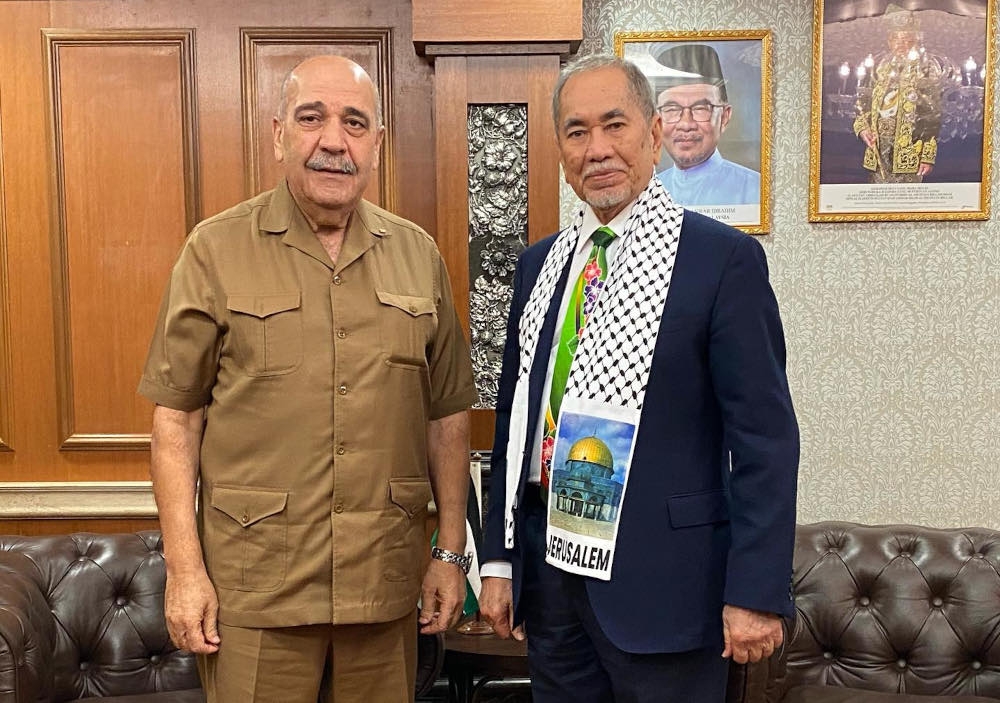 Dewan Negara president Tan Sri Wan Junaidi Tuanku Jaafar and Palestinian Ambassador to Malaysia Walid Abu Ali at the Parliament House, October 23, 2023. — Picture from Facebook/Tan Sri Dr Haji Wan Junaidi Bin Tuanku Jaafar