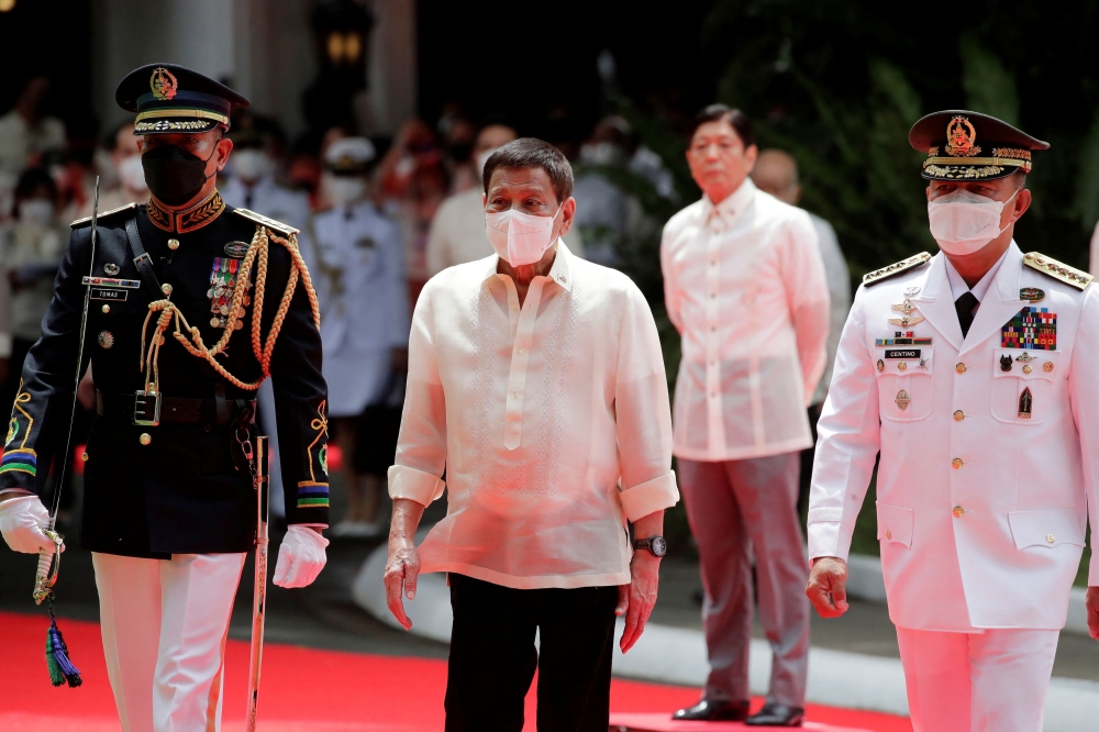Former Philippine President Rodrigo Duterte gave on-air advice to his daughter, Vice President Sara Duterte, about how she could use intelligence and confidential funds allocated to her office and the education department, which she also heads. — Pool via Reuters pic