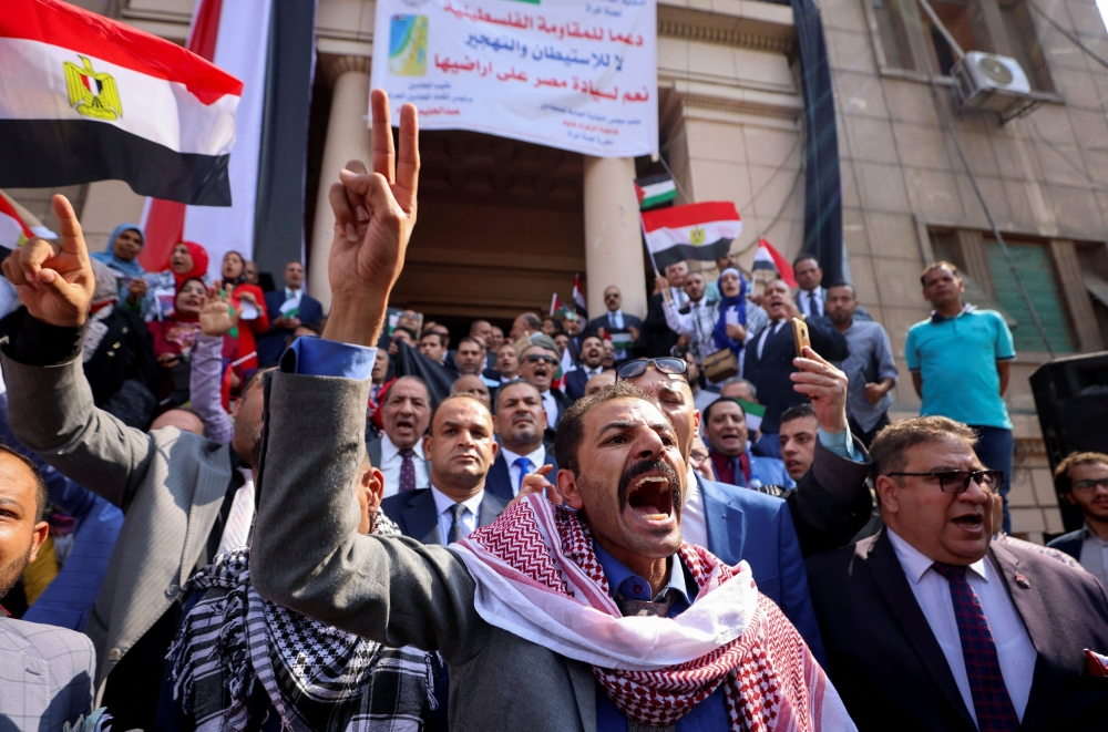 Egyptian lawyers protest in support of Palestinians, amid the ongoing conflict between Israel and the Palestinian Islamist group Hamas, in front of the Bar Association, in Cairo, Egypt, October 22, 2023. — Reuters pic