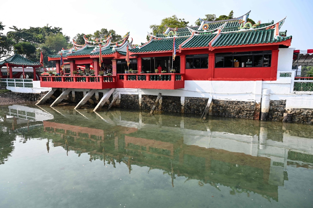 Tens of thousands of Taoist, Buddhist and Confucian devotees are making the annual pilgrimage to Da Bo Gong Temple until November 12 to mark its 100th year on the island. — AFP pic