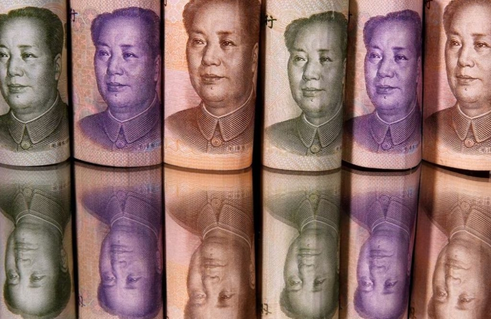 Asian stocks rose from 11-month lows as investors cheered China’s approval of a trillion-yuan sovereign bond issue as a harbinger of stimulus. — Reuters pic