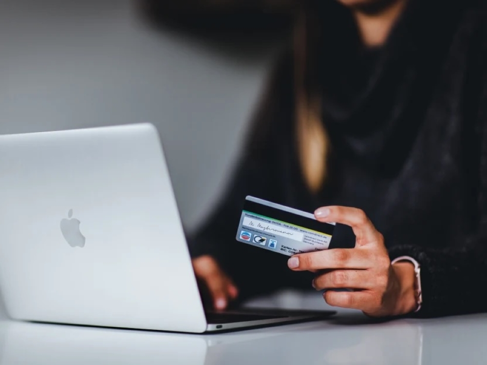 Consumers would have to bear losses only if both the financial institutions and telcos have met all their obligations, the paper proposed. — Unsplash pic via TODAY