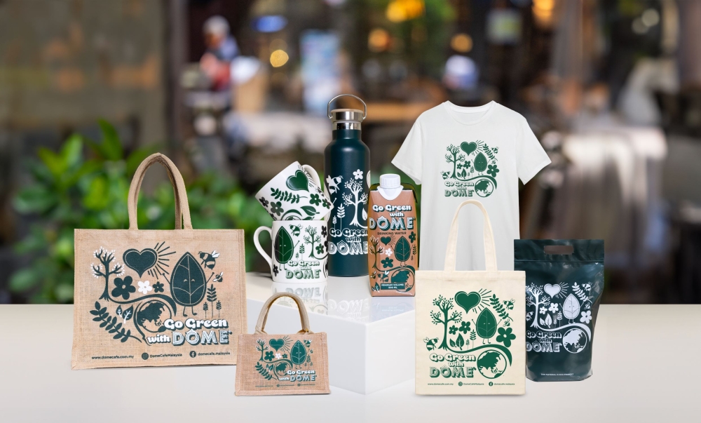 DÔME Café Malaysia has introduced Go Green merchandise featuring shopping bags and T-shirts. — Picture courtesy of The Melium Group