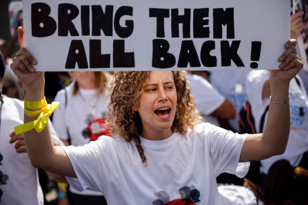 Families and supporters of hostages that are being held in Gaza after they were kidnapped from Israel by Hamas, attend a protest calling for their immediate release in Tel Aviv, Israel October 26, 2023. — Reuters pic