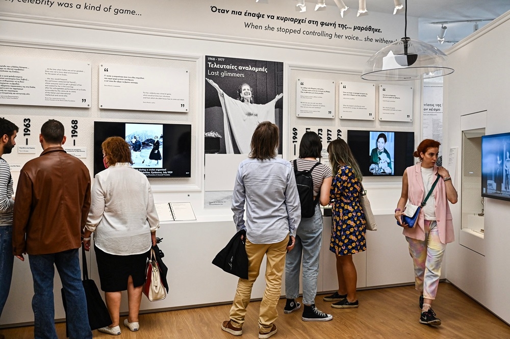 Visitors stand in one of the rooms of the Maria Callas Museum during its official opening in Central Athens. — AFP pic