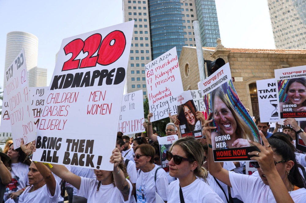 Families and supporters of hostages that are being held in Gaza after they were kidnapped from Israel by Hamas gunmen, attend a protest calling for their immediate release in Tel Aviv, Israel October 26, 2023. — Reuters pic