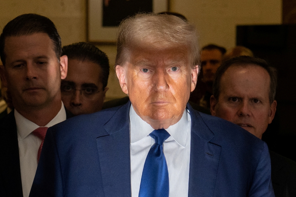 Former US President Donald Trump attends the Trump Organization civil fraud trial, in New York State Supreme Court in the Manhattan borough of New York City October 25, 2023. — Reuters pic