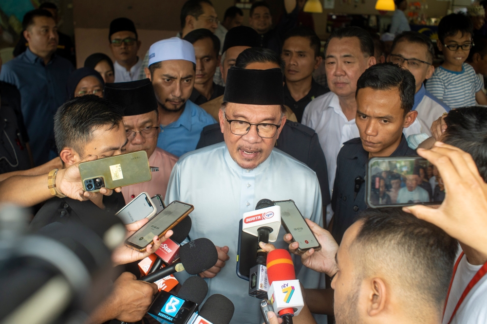 Prime Minister Datuk Seri Anwar Ibrahim speaks to reporters in Dengkil October 27, 2023. ― Picture by Shafwan Zaidon