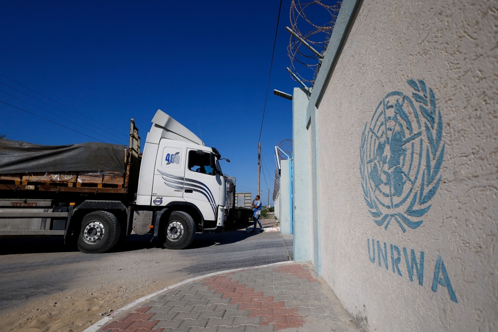 An aid truck arrives at a UN storage facility as the conflict between Israel and Palestinian Islamist group Hamas continues, in the central Gaza Strip October 21, 2023. — Reuters pic