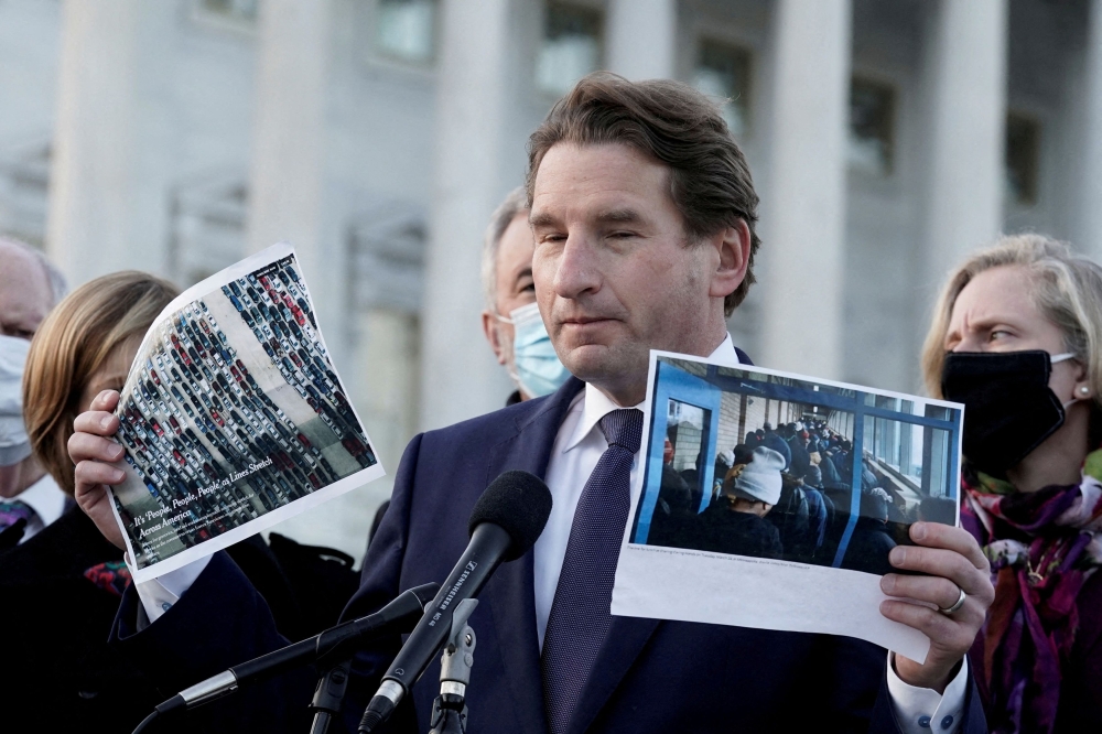 Rep. Dean Phillips (D-MN) with the Problem Solvers Caucus and other members, speaks at a news conference on the forthcoming passage of the bipartisan emergency Covid-19 relief bill in Washington, DC December 21, 2020. — Reuters pic