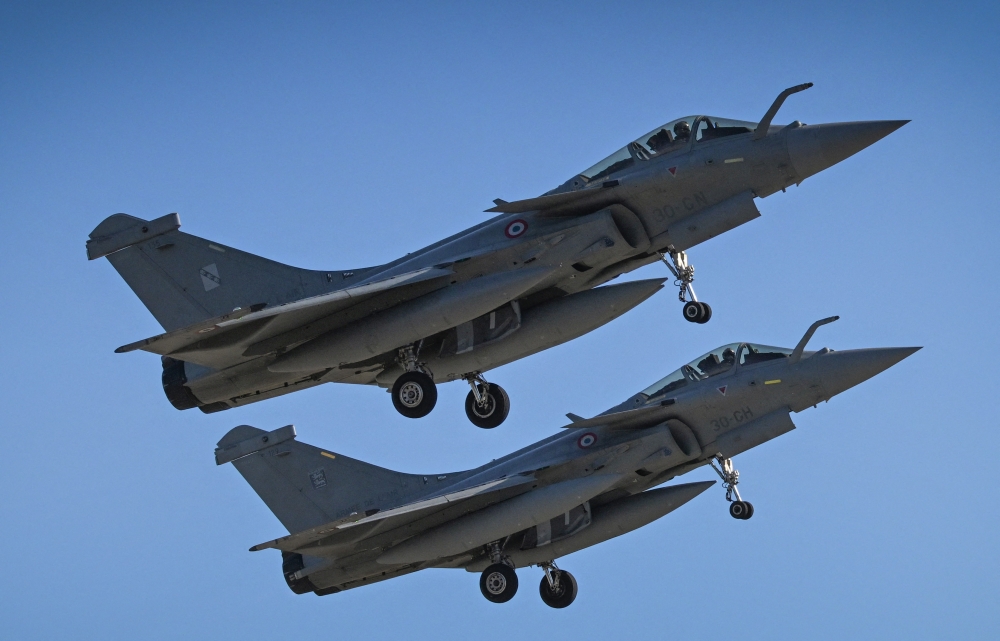 Two Dassault Rafale fighter jets take off for a mission from Fetesti Air Base, in the commune Borcea, near the town of Fetesti, Romania October 19, 2023. — AFP pic